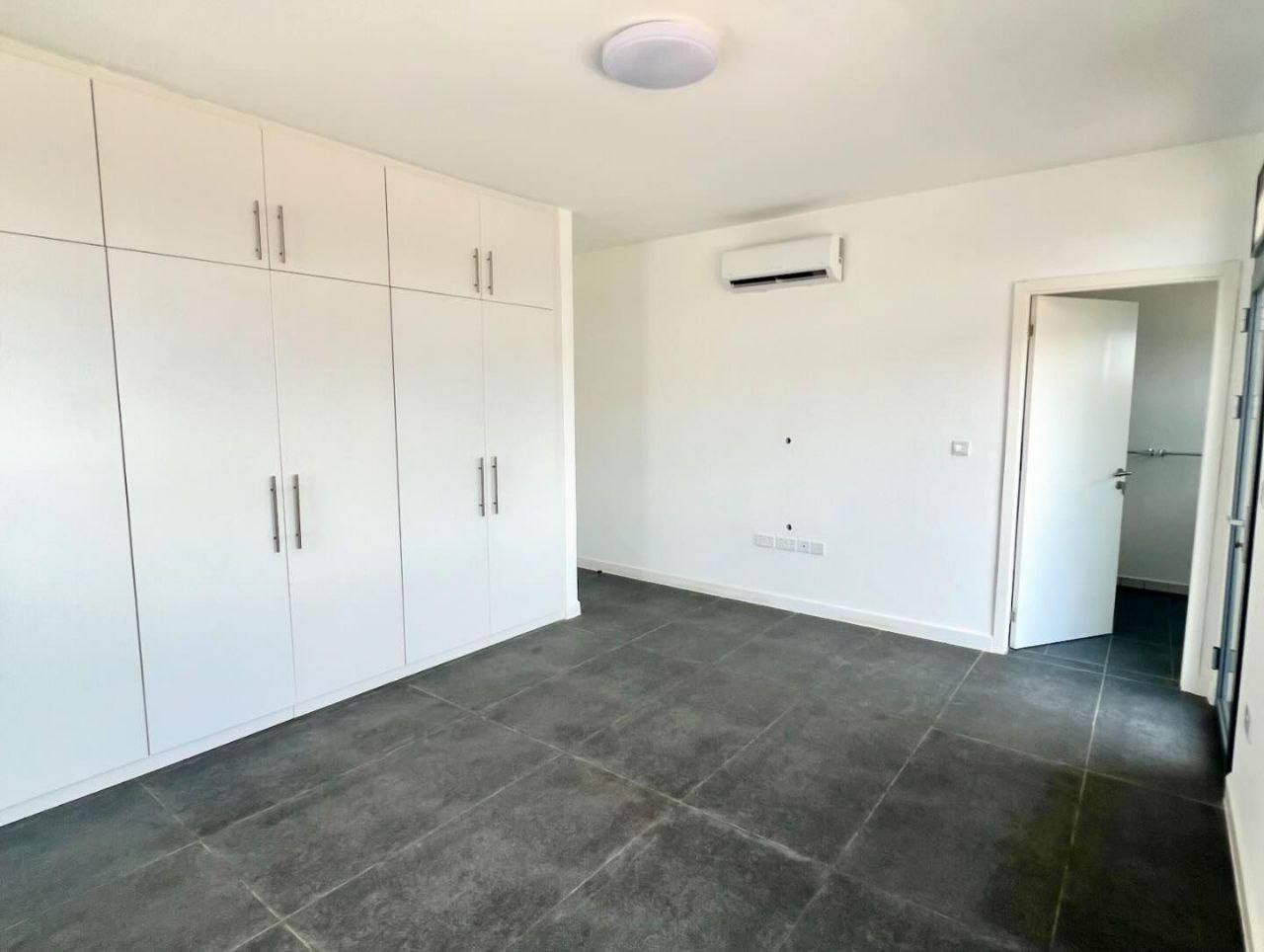 A white wall with a white wall and a white wall